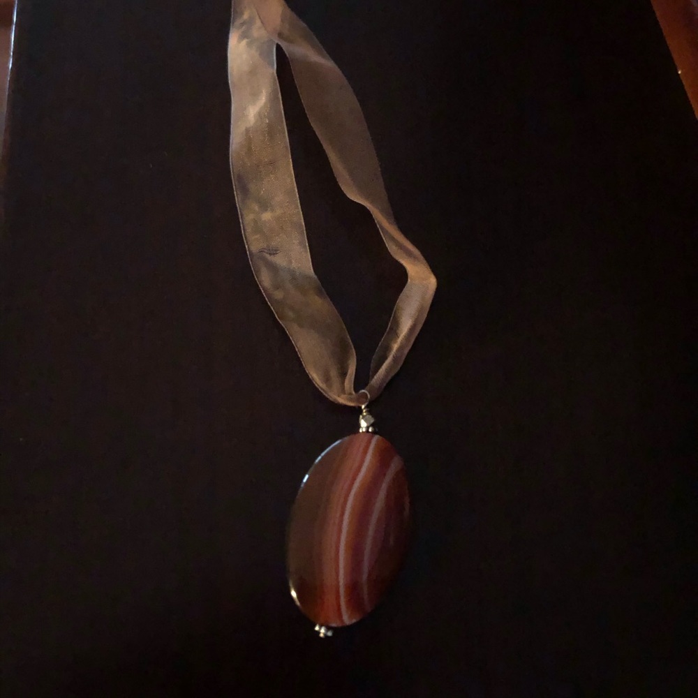 Polished stone necklace on ribbon